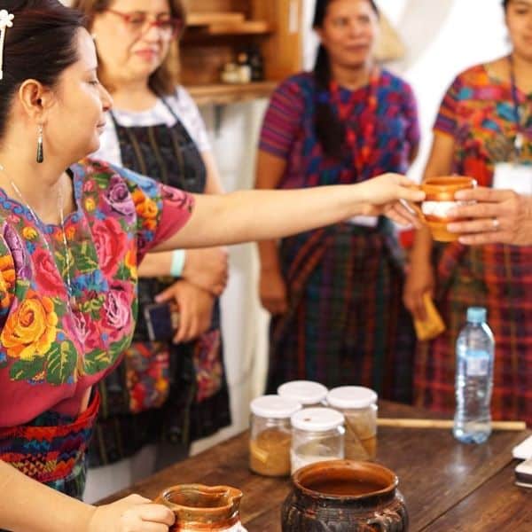 Nobi Woman Handing Drink