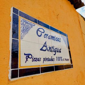 Ceramic shop sign on the wall